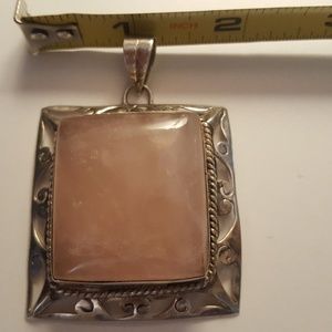Large rose quartz pendant in sterling silver frame